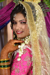 indian bride wearing traditional wedding cloths in marriage ceremony.